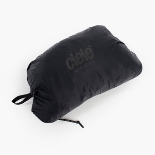 view of the ciele athletics VNTJacket lightweight running jacket for men in shadowcast color when folded in one of it's pocket