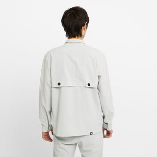 back view of ciele athletics CCJacket unisex running jacket from the Lifestyle Edition collection, in light grey color, on a model