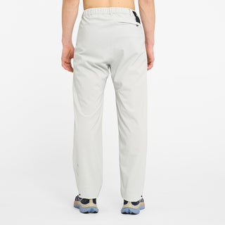 back view of ciele athletics CCPants unisex running pants from the Lifestyle Edition collection, in light grey color, on a model