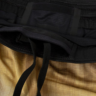 detail view of the drawstring of the ciele athletics lightweight, race ready and performance driven short named RDShort in sphinx color