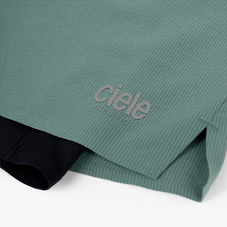 detail view of the reflective ciele logo on the ciele athletics WRKShort unisex running and technical short from the Lifestyle Edition collection, in silver pine color