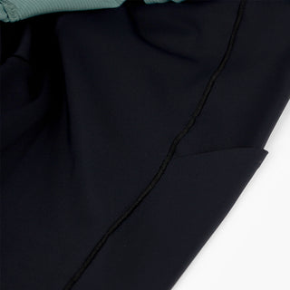 detail view of the phone pocket in the half tight of the ciele athletics WRKShort unisex running and technical short from the Lifestyle Edition collection, in silver pine color