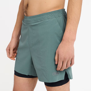 close front view of ciele athletics WRKShort unisex running and technical short from the Lifestyle Edition collection, in silver pine color, on a model