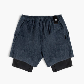 back view of ciele athletics WRKShort unisex running and technical short from the Lifestyle Edition collection, in denim indigo color, on a model