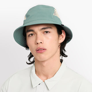 front view of ciele athletics GOBucket unisex running bucket hat from the Lifestyle Edition collection, in silver pine color, on a model