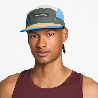 front view of the ciele athletics GOCap unisex running hat in seaweed color, on a model