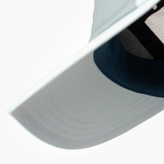 underbrim view of the ciele athletics FSTCap unisex running hat with a curved brim in neutral grey color