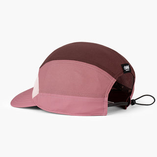 back view of the ciele athletics FTSCap unisex running hat with a curved brim in peachskin color