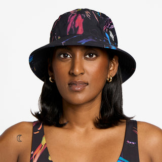 front view of ciele athletics GOBucket Comp Athletics unisex running bucket hat in the summer night limited edition, on a model