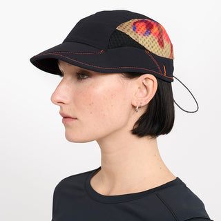 side view of ciele athletics new FSTCap ethereal unisex running hat from the Elite collection in shadowsphinx color, on a model