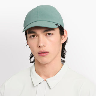 front view of ciele athletics CRWCap short brim unisex running hat with shorter brim from the Lifestyle Edition collection, in silver pine color, on a model