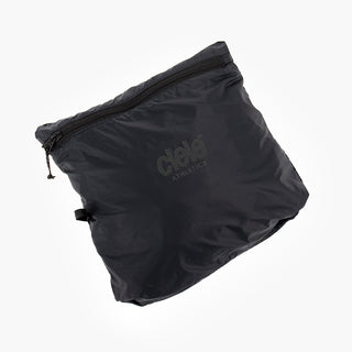 view of the ciele athletics VNTJacket lightweight running jacket for women in shadowcast color when folded in one of it's pocket