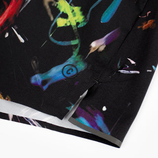 close up of the logo and reflective details of the ciele athletics ATShort 4 inch with liner short from the summer nights limited edition capsule