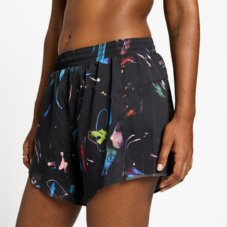 side view of ciele athletics ATShort 4 inch with liner short from the summer nights limited edition capsule, on a model