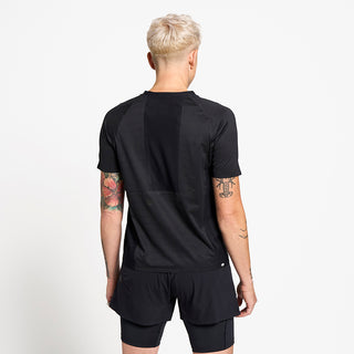 back view of the ciele athletics lightweight, race ready and performance driven T-Shirt for womens named RCDTShirt in shadowsphinx color, on a model