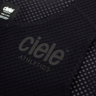 close up of the ciele logo of the ciele athletics lightweight, race ready and performance driven Singlet for womens named RDCRPSinglet in shadowsphinx color