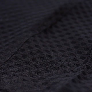 close up of the fabric of the ciele athletics lightweight, race ready and performance driven Singlet for womens named RDCRPSinglet in shadowsphinx color