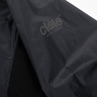 closeup view of the reflective sleeve logo of the ciele athletics VNTJacket lightweight running jacket for men in shadowcast color