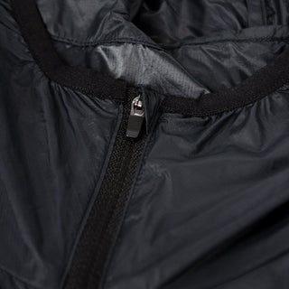 closeup view of the zipper of the ciele athletics VNTJacket lightweight running jacket for men in shadowcast color