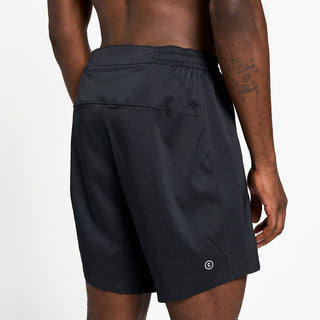 close back view of ciele athletics TRNShort 7 inch linerless short in shadowcast color on a model