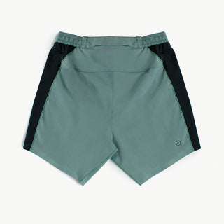 back view of ciele athletics TRNShort 7 inch linerless short in silver pine color