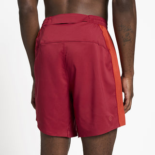 close back view of ciele athletics TRNShort 7 inch linerless short in merlot color on a model