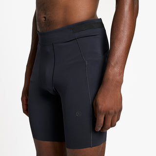 back view of ciele athletics FSTTight 8 inch short running tight in shadowcast on a model