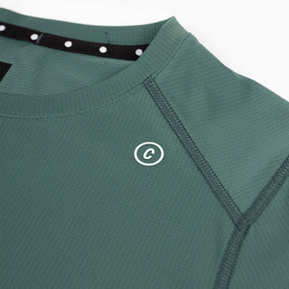 close view of c logo on the ciele athletics FSTTShirt lightweight and performance driven T-Shirt in silver pine