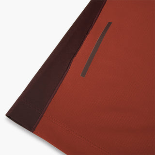 close view of the back reflective detail on the ciele athletics DLYTshirt lightweight and performance driven T-Shirt in dark wine red