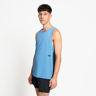 side view of ciele athletics DLYTSinglet lightweight and performance driven singlet in dusty blue on a model