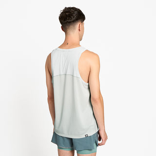 back view of ciele athletics DLYTSinglet lightweight and performance driven singlet in light grey on a model