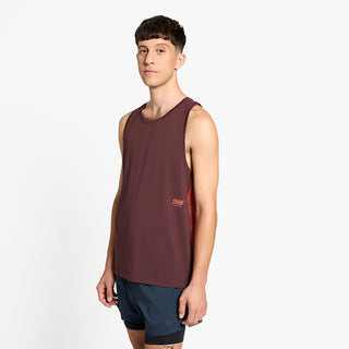 side view of ciele athletics DLYTSinglet lightweight and performance driven singlet in dark wine red on a model