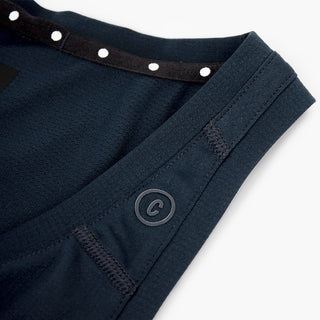 close view of c logo on the ciele athletics FSTSinglet lightweight and performance driven singlet in deepspace