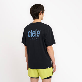 back view of ciele athletics unisex ORTShirt with athletics logo in ironcast color on a model