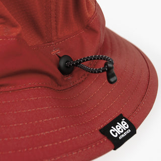 close up view of the ciele athletics GOBucket Comp Athletics unisex running bucket closure in the clay color