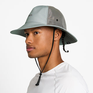 side view of the ciele athletics TRLBucket unisex running bucket hat in neutral grey color, on a model