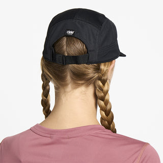 back view of ciele athletics GOCap unisex running hat in shadowcast color on a model