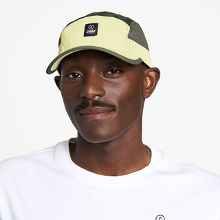 front view of ciele athletics GOCap C Classic C Plus Box unisex running hat in glade color on a model