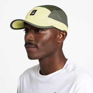 side view of ciele athletics GOCap C Classic C Plus Box unisex running hat in glade color on a model