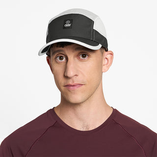 front view of ciele athletics GOCap C Classic C Plus Box unisex running hat in withaker color on a model