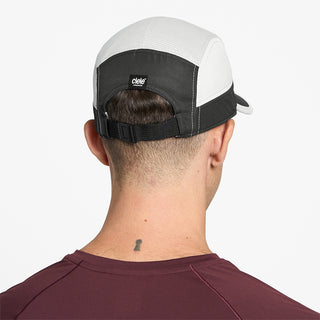 back view of ciele athletics GOCap C Classic C Plus Box unisex running hat in withaker color on a model