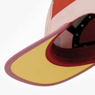 underbrim view of the ciele athletics GOCap Field Iconic Bar unisex running hat in peachskin seaweed color