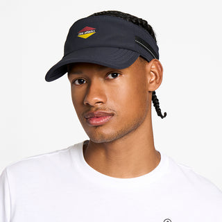 front view of the ciele athletics TRLCap unisex running visor with a curved brim in black color, on a model