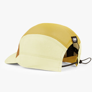 underbrim view of the ciele athletics FSTCap SC Comp Iconic VC unisex running hat in dark ochre sulfur color