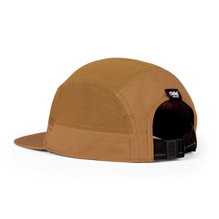 back view of ciele athletics GOCap Comp Bars unisex running hat in dark ochre color