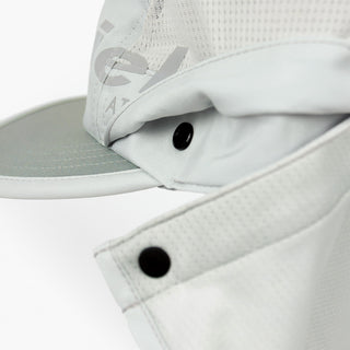 detail view of ciele athletics GOCap PYN Comp one hundred unisex running bucket hat in light grey color snaps for the removable the neck protector