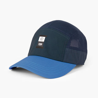 front view of ciele athletics GOCap Comp C cube unisex running hat in indigo color