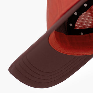 underbrim view of the ciele athletics GOCap with a curved brim unisex running hat in clay color