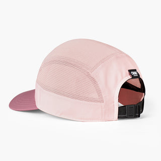 back view of the ciele athletics GOCap with a curved brim unisex running hat in peachskin color