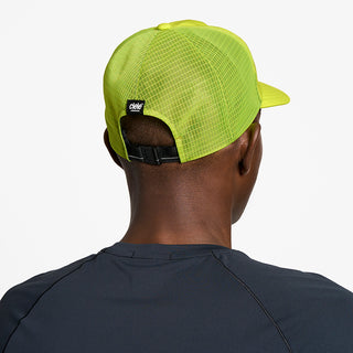 back view of ciele athletics TRLCap SC Comp unisex running hat in lucifer yellow color on a model